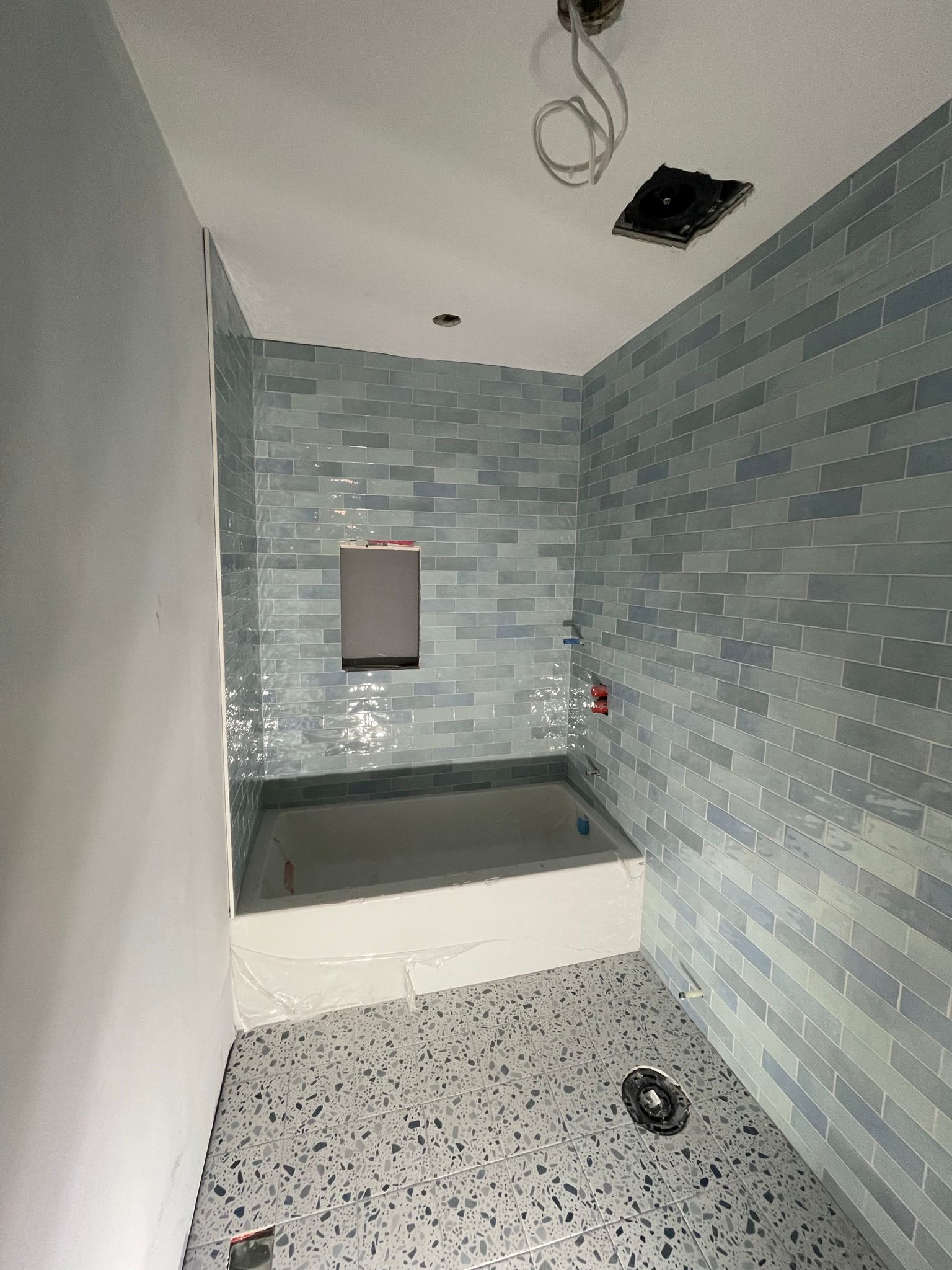 Luxury washroom tile renovation project